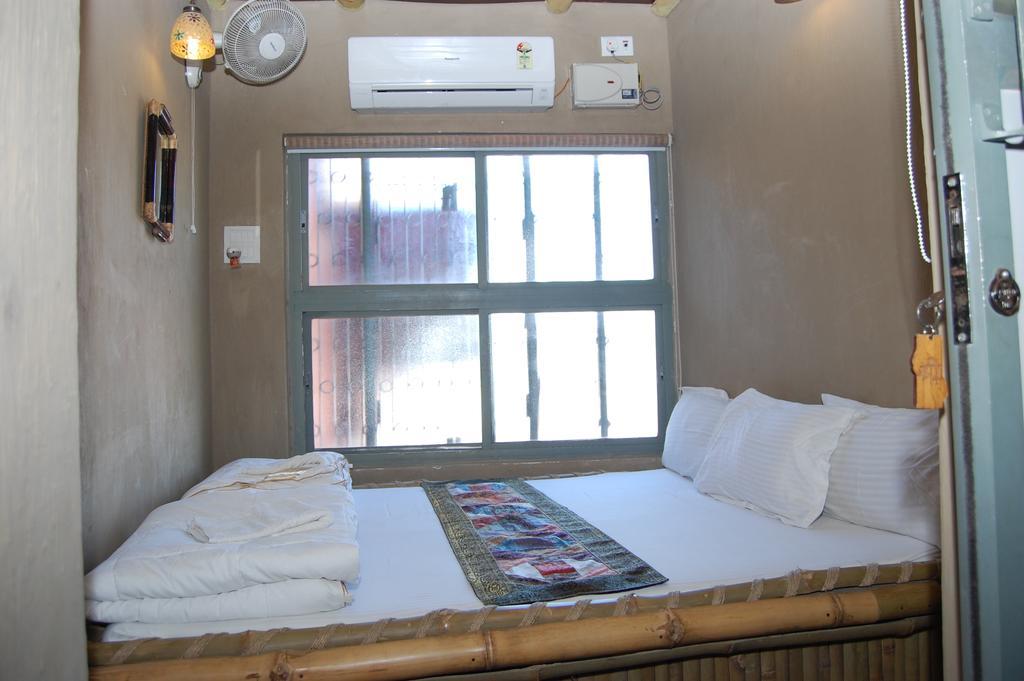 Shri Guest House Váránasí Pokoj fotografie