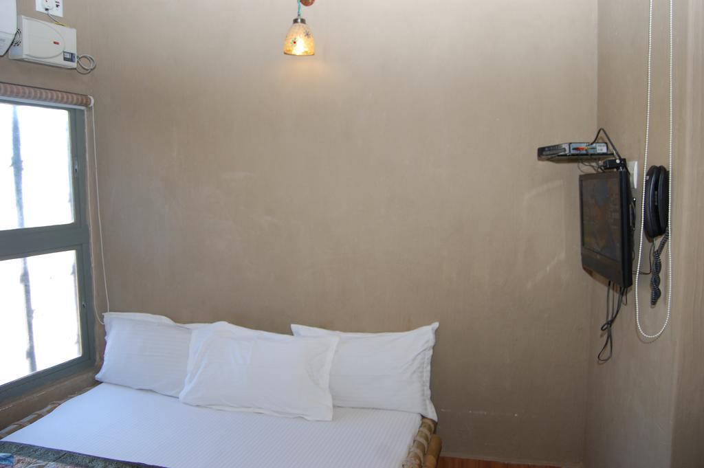 Shri Guest House Váránasí Pokoj fotografie